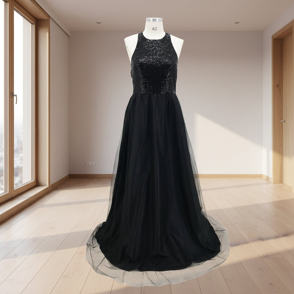 Black evening gown with sequined top on a white background