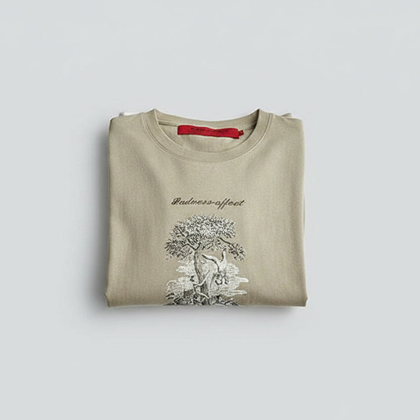 Front view of men’s Yinshan Tide loose fit cotton T-shirt in casual streetwear style