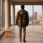 Front view of men’s quilted hooded jacket designed for warm winter streetwear style