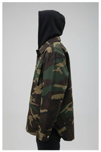 Front view of men’s quilted hooded jacket designed for warm winter streetwear style