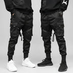 Front view of men’s ribbon harem cargo joggers with elastic waist and streetwear style