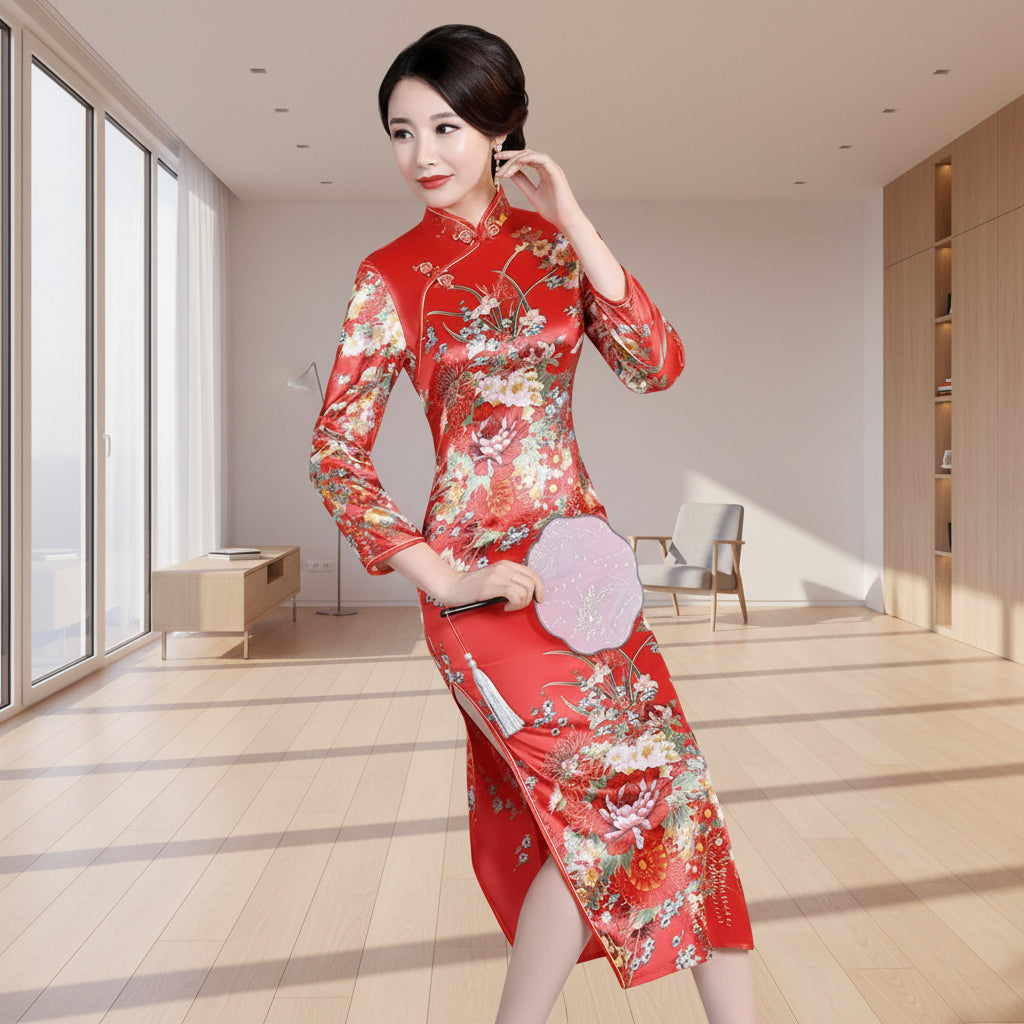 Woman in a red floral dress sitting at a wooden table with tea sets.